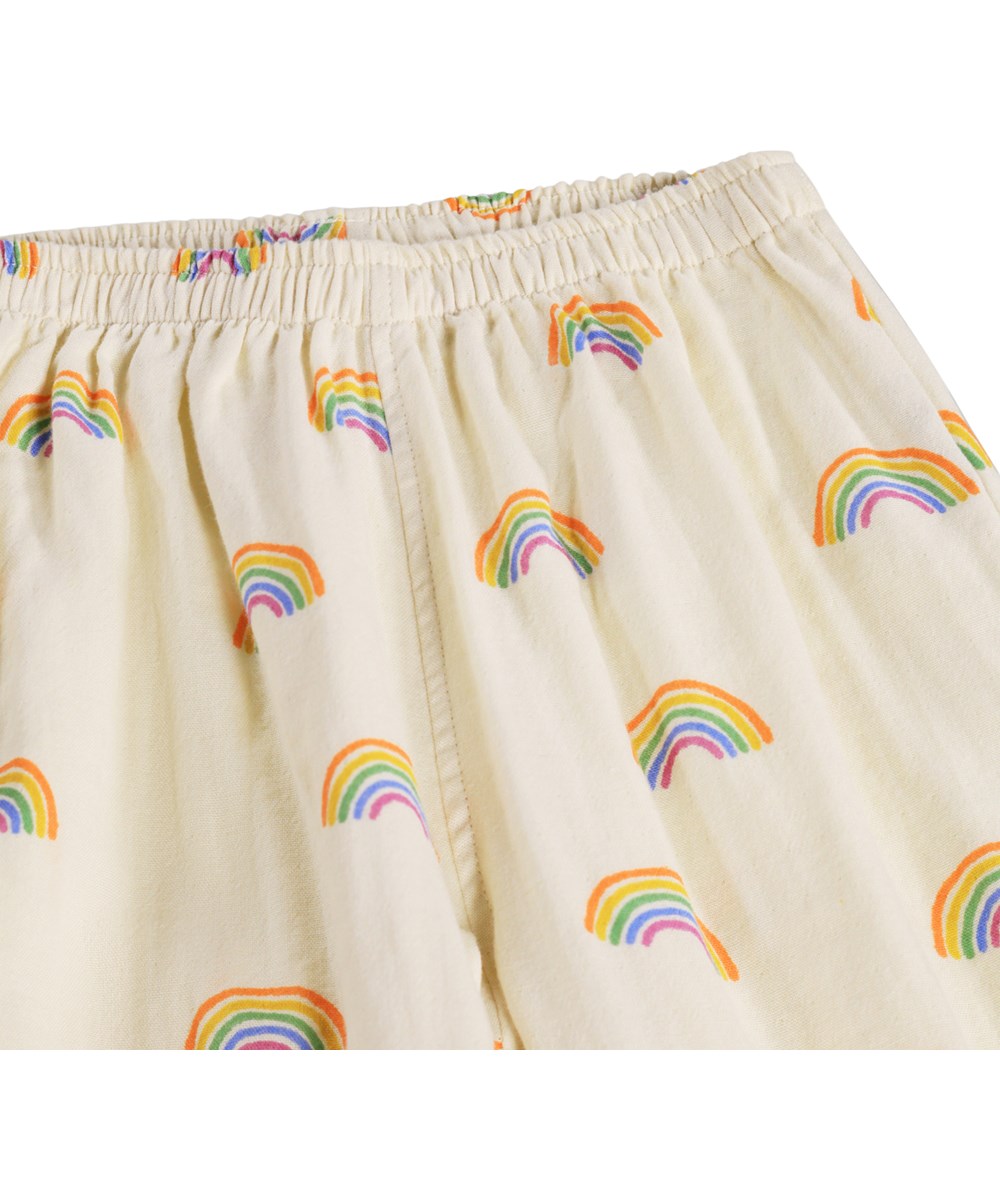 Serene - Small Rainbows - Beige, weiche Hosen für die Kleinen aus Bio-Baumwolle mit Regenbogenmuster