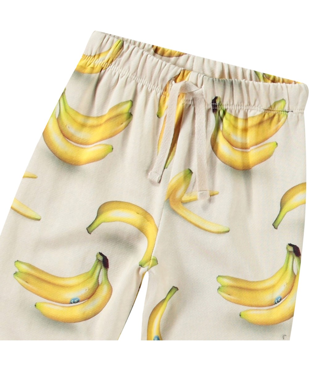 Simeon - Babynanas - Weiche Hose mit Bananenmuster aus Öko-Baumwolle für Babys.