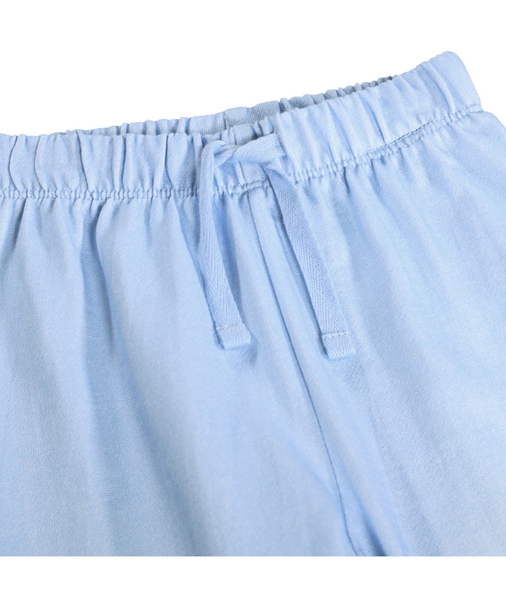 Simeon - Little Bows - Weiche, blaue Jogginghosen für die Kleinen aus Bio-Baumwolle mit Blumenmuster