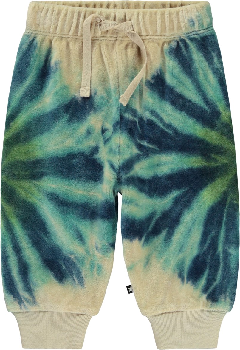 Simeon - Tie Dye Blues - Beige Öko-Babyhose aus Baumwollvelours mit blauem Batikmuster