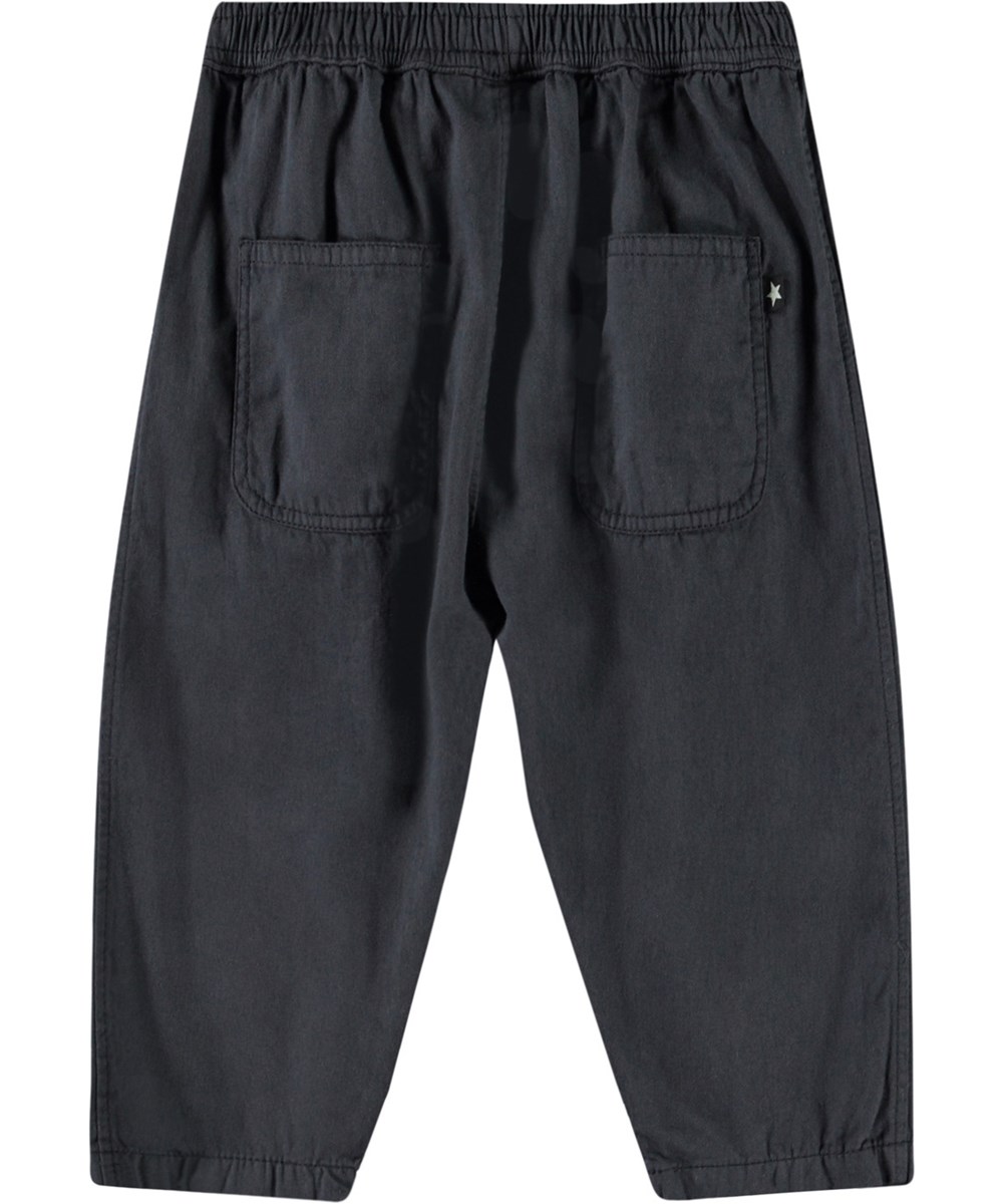 Sois - Unexplored - Schwarze Hose aus Öko-Baumwolle für Babys.