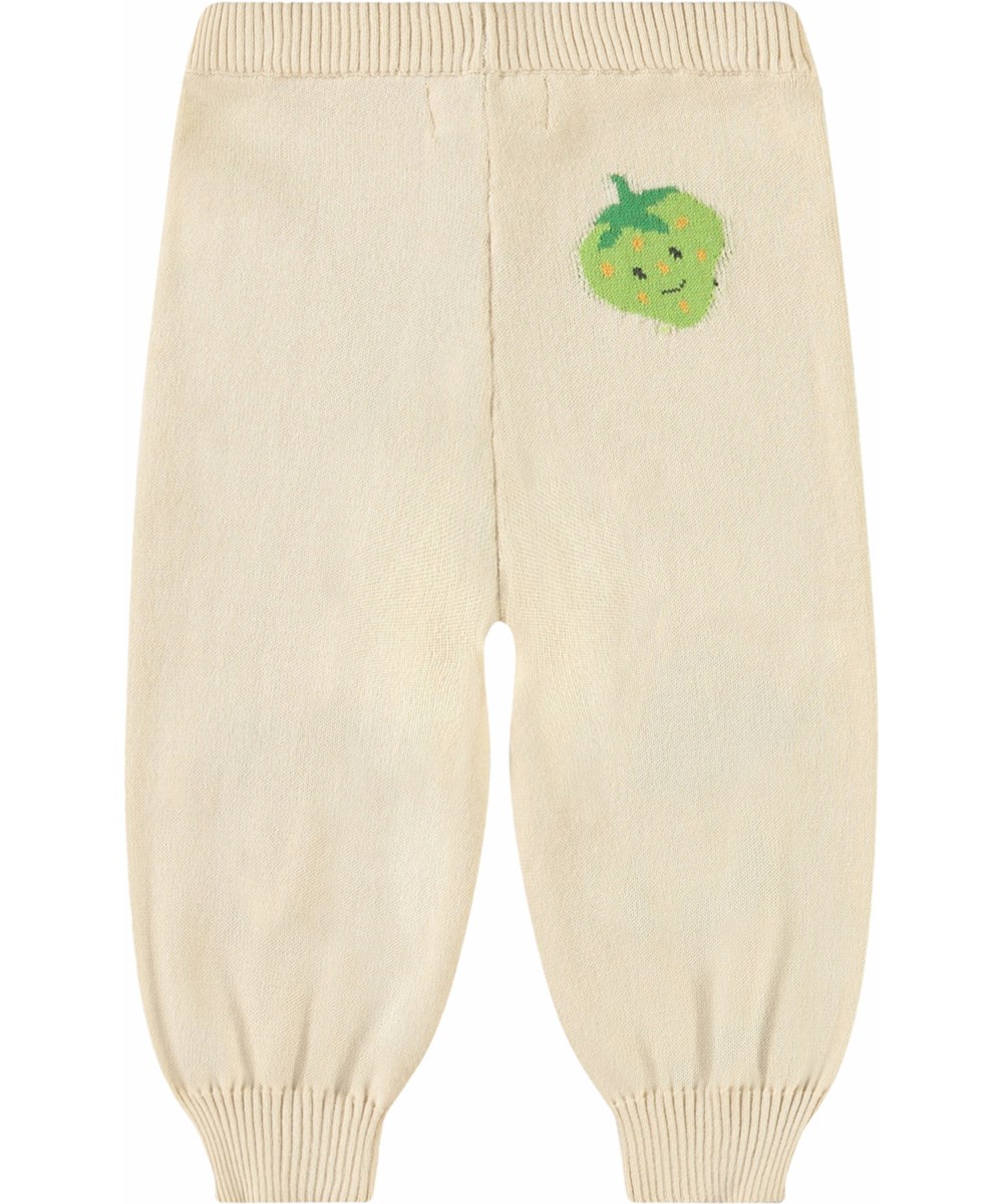 Sol - Cute Fruits - Gestrickte Hose aus Öko-Baumwolle für Babys. Gestrickt in hellem Beige und verziert mit niedlichen Früchten.