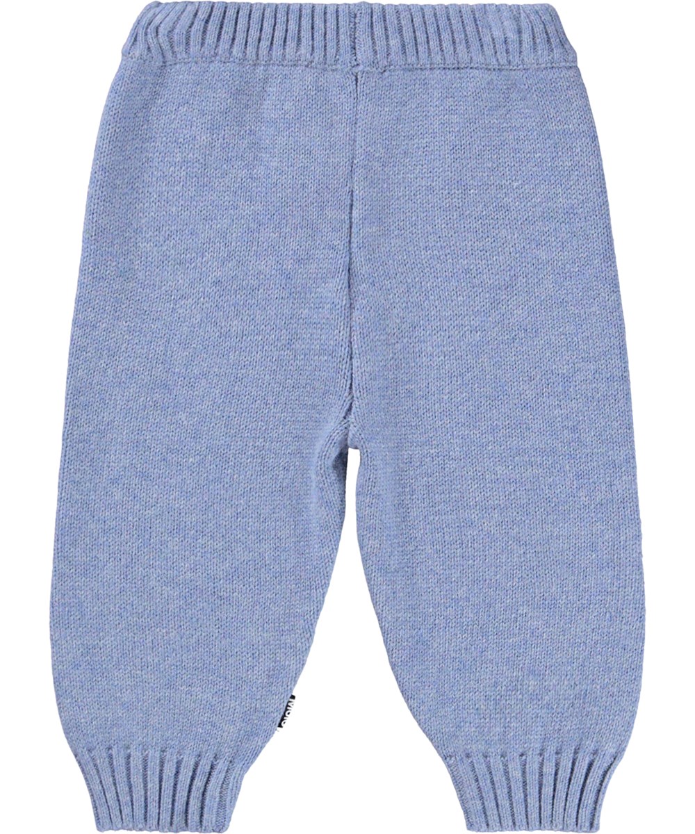 Sol - Toy Buddies - Helle blaue Hosen für die Kleinen aus einem weichen Rippenstrick aus Baumwolle und Wolle mit einem Kaninchen und einem Elefanten auf den Knien.