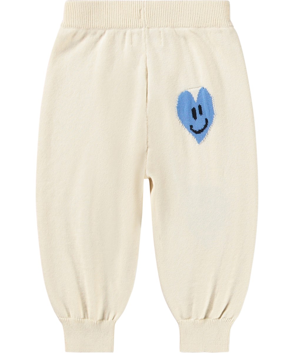 Solana - Heart Vibes - Weiche, weiße Strickhosen für die Kleinen aus Bio-Baumwolle mit Herzen