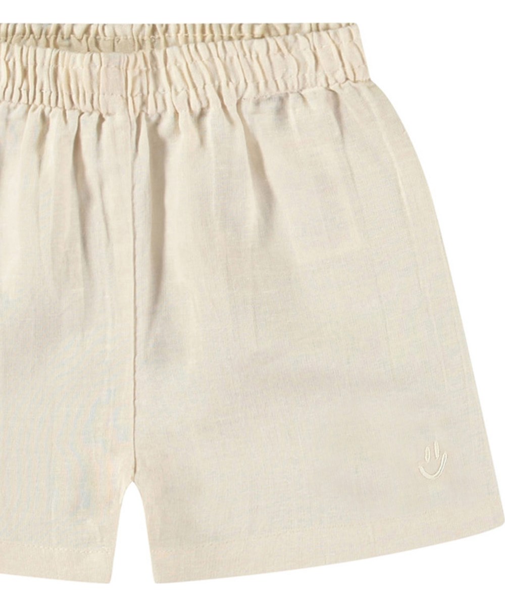 Solar - Summer Sand - Beige linnen zomer babyshort.