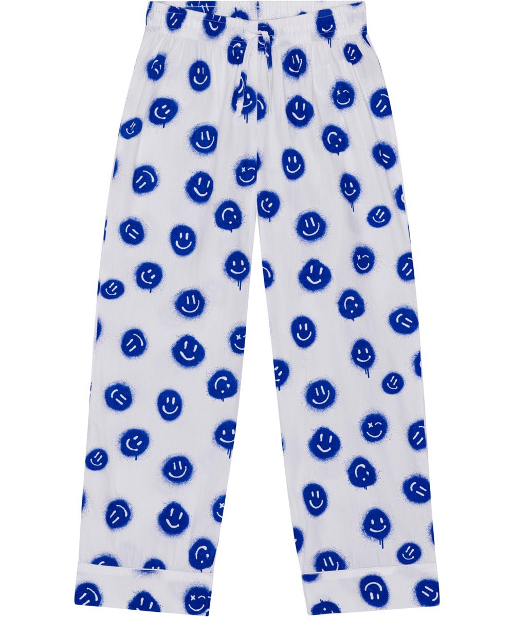 Lex - Smiles White - Witte pyjama van zacht bioloigsch katoen met een print van blauwe smiley's