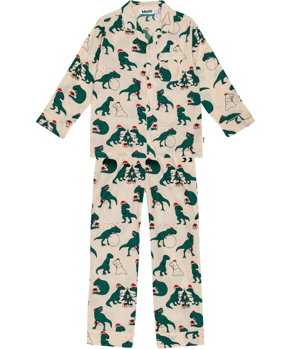 Lex US -  Dino Dreams - Beige en groene pyjama in een normale pasvorm met een dinosaurusprint.