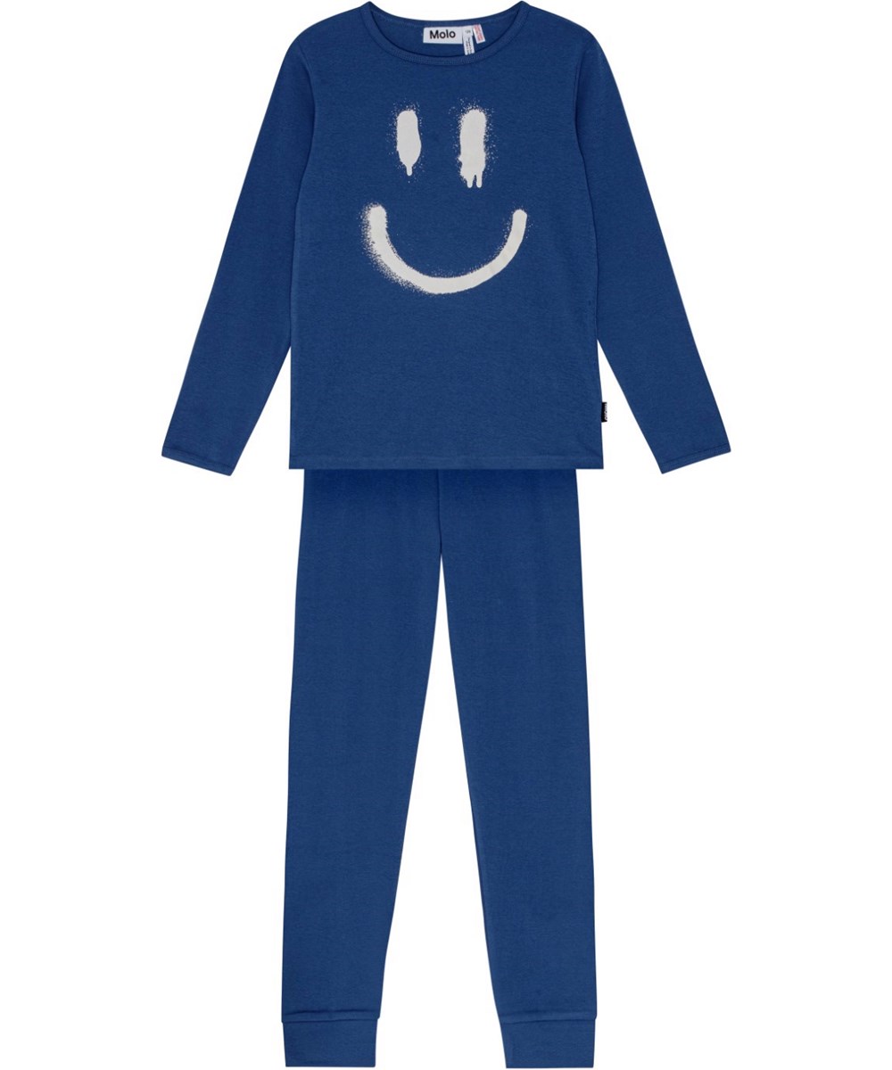 Lue - Calm Fjord - Donkerblauwe biologisch katoenen pyjamamet elastische taille en ribboorden. Bovenstuk heeft wit gespoten smiley.