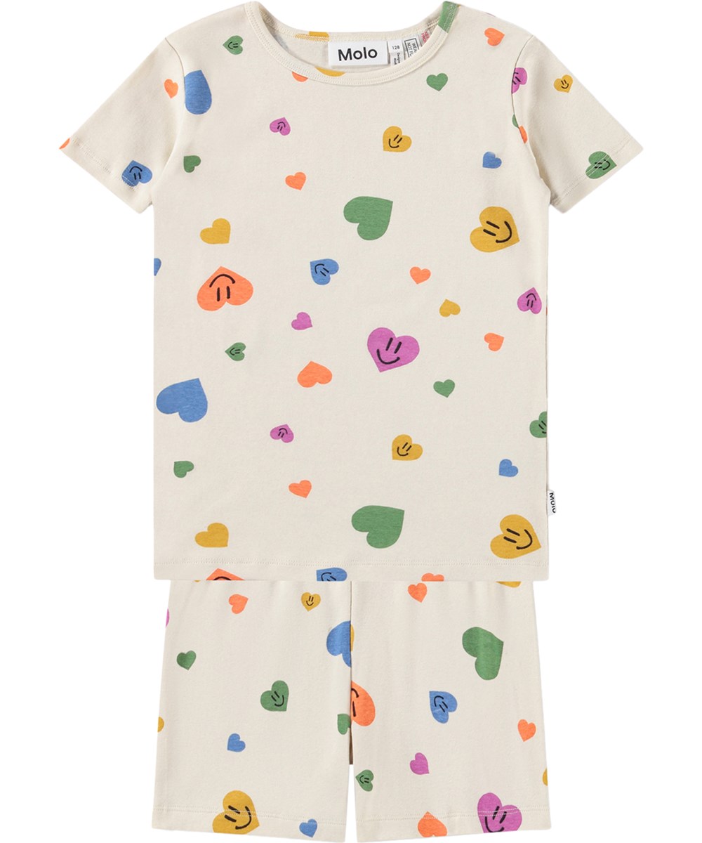 Lou US - Confetti Smiles - Beige todelt nattøj med hjerteprint i økologisk bomuld til børn