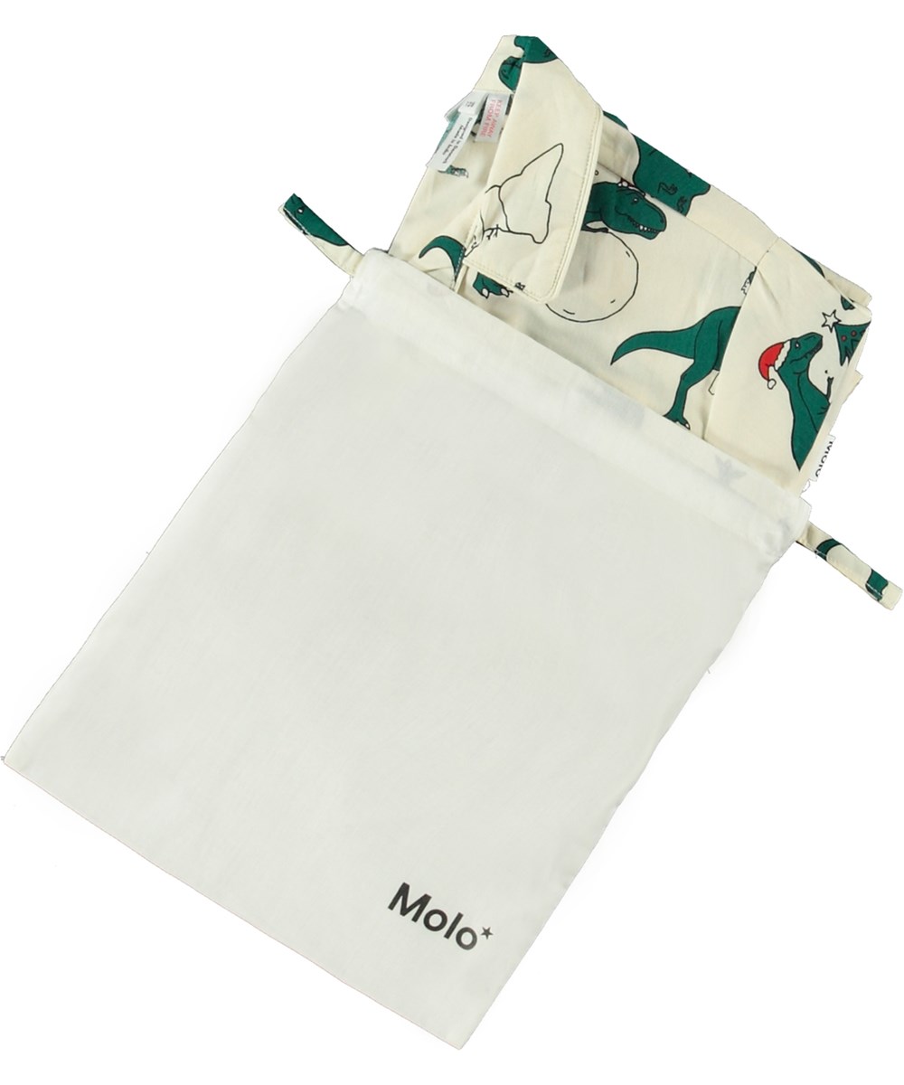 Lex -  Dino Dreams - Beige and green organic cotton pyjama set with dinosaur print.