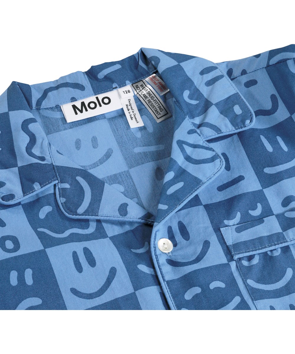 Lex - Blue Vibes - Blue checked pyjama set for children made of organic cotton with a print 