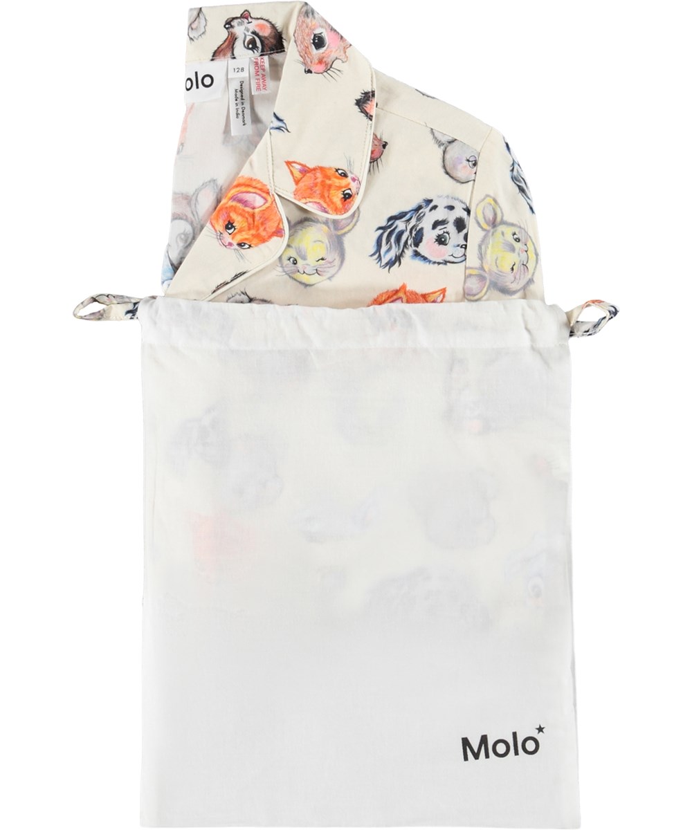 Lex - Itty Bitty Cream - Off-white pyjama set for children made of organic cotton with a print of cute drawn animals.