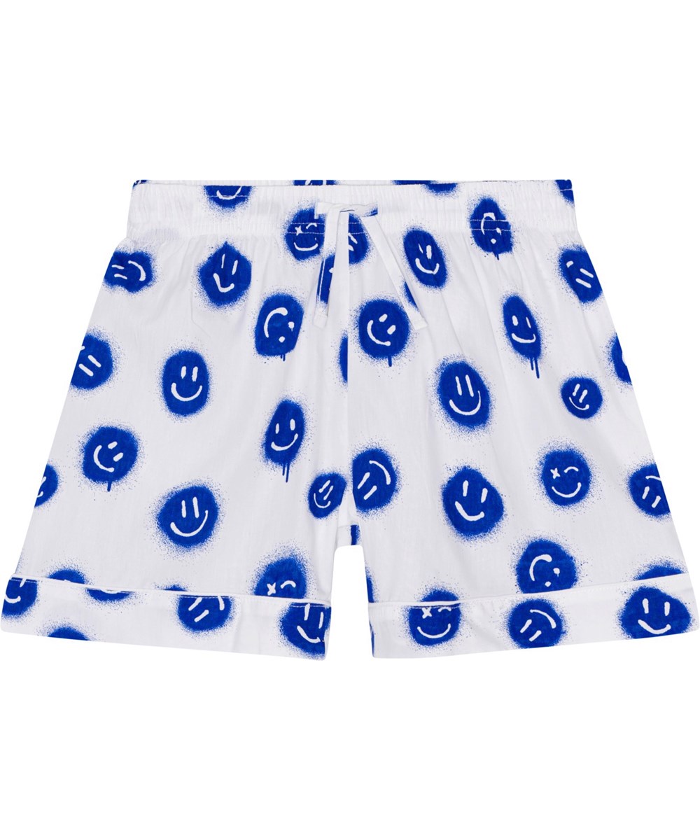 Lexi - Smiles White - White nightwear shorts set in soft, organic cotton with a print of blue smiling faces