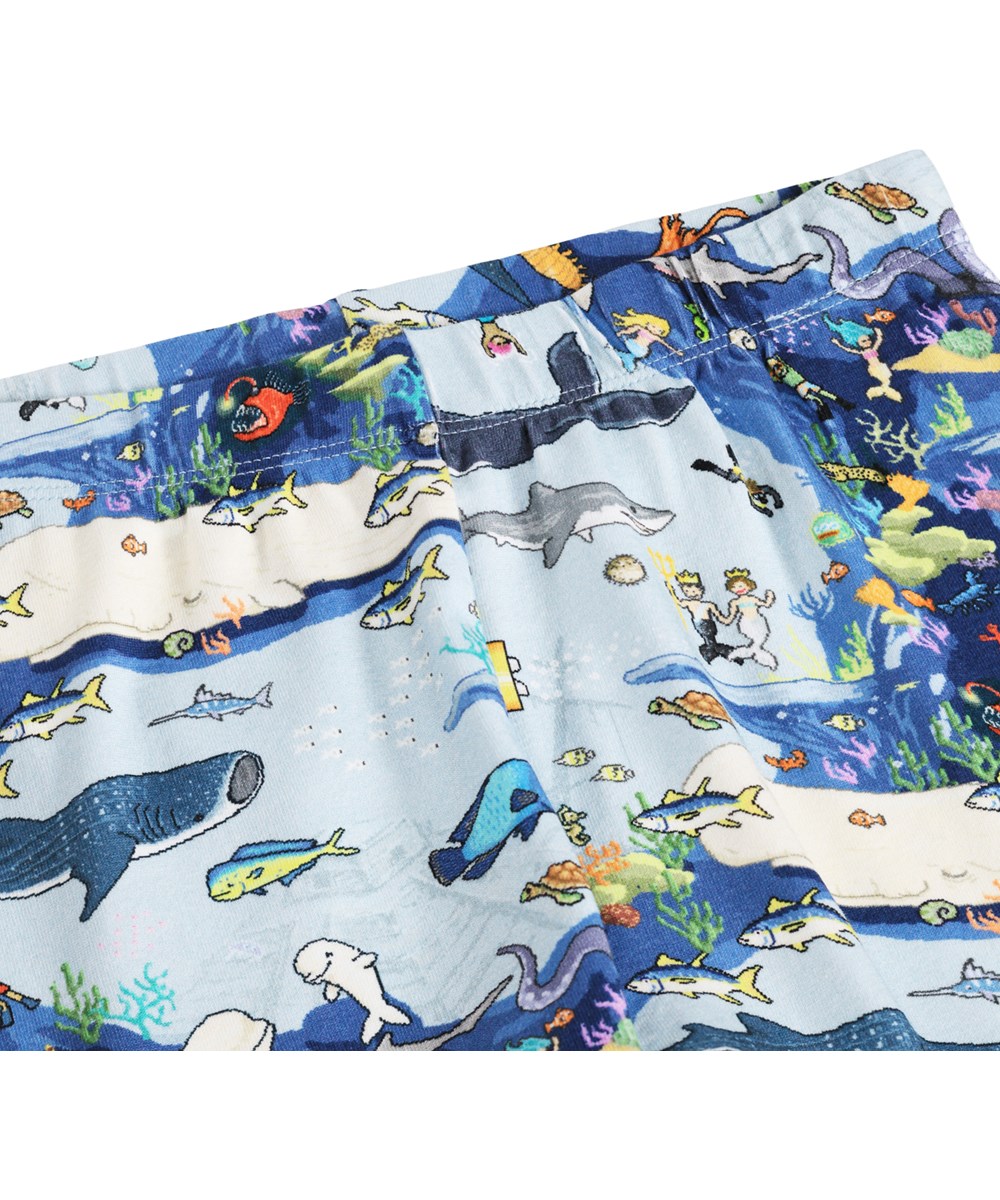 Lou US - Pixel Sea - Blue two-piece pyjamas for children made of organic cotton with a print