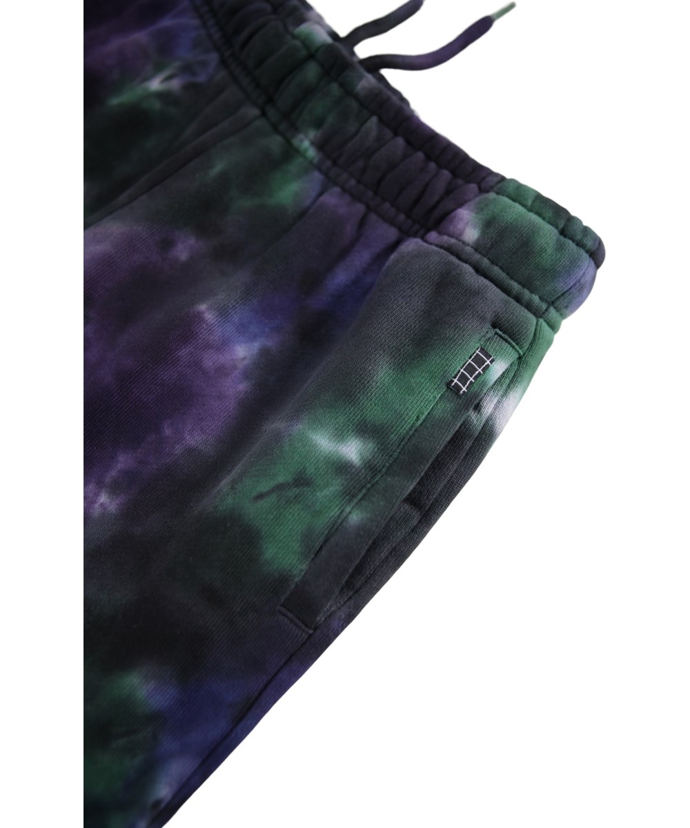 Adan - Dark Sky Dye - Multicolored tie-dye sweatpants for children made of organic cotton.