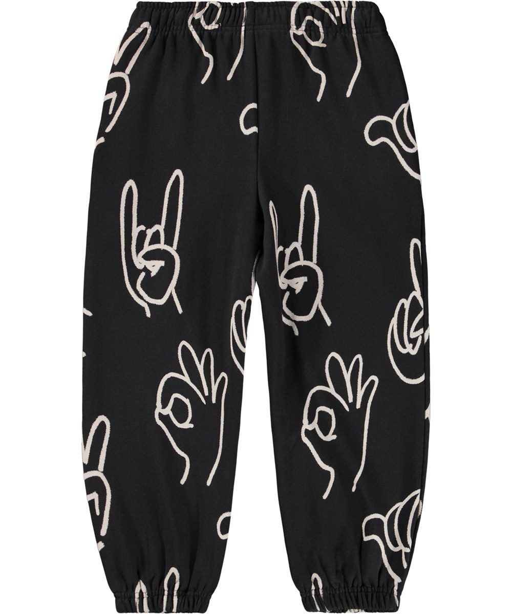 Adan - Drawn Hands - Black sweatpants for children made of organic cotton with a hand sign print.