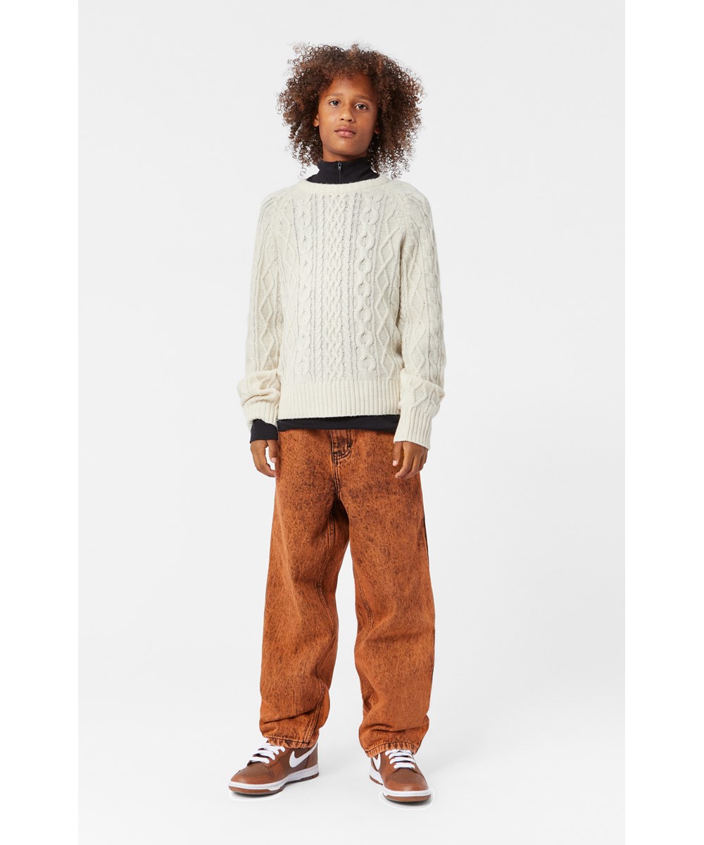 Aiden - Fiery Dye - Orange wash organic cotton jeans with loose fit and straight legs. 5 pockets with zip fly. Adjustable elastic waistband.