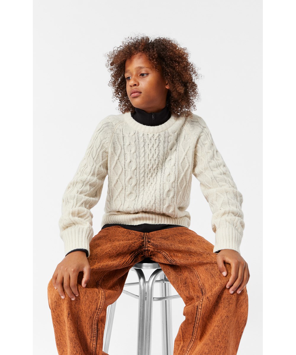 Aiden - Fiery Dye - Orange wash organic cotton jeans with loose fit and straight legs. 5 pockets with zip fly. Adjustable elastic waistband.