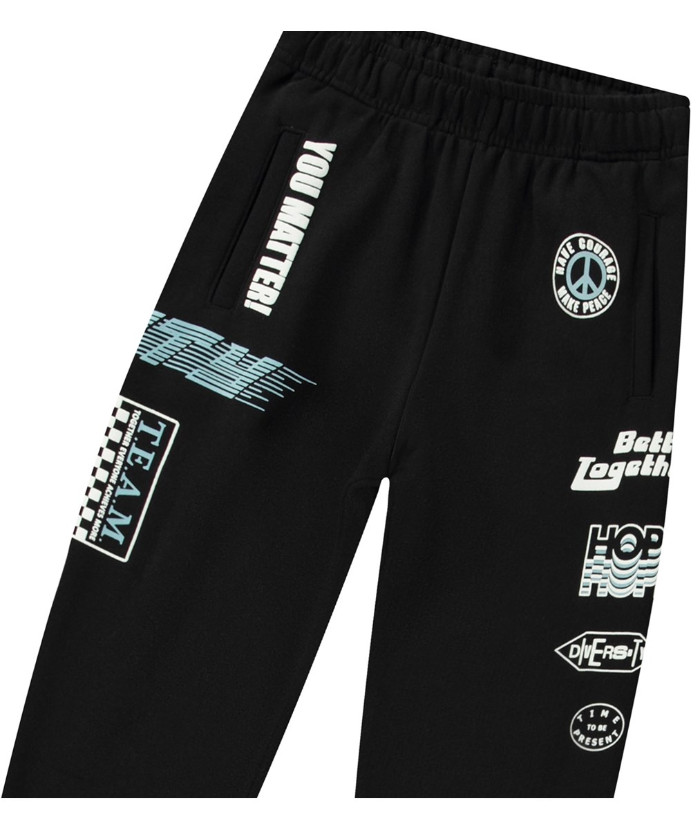 Allen - Messages! - Organic cotton sweatpants with motocross details.
