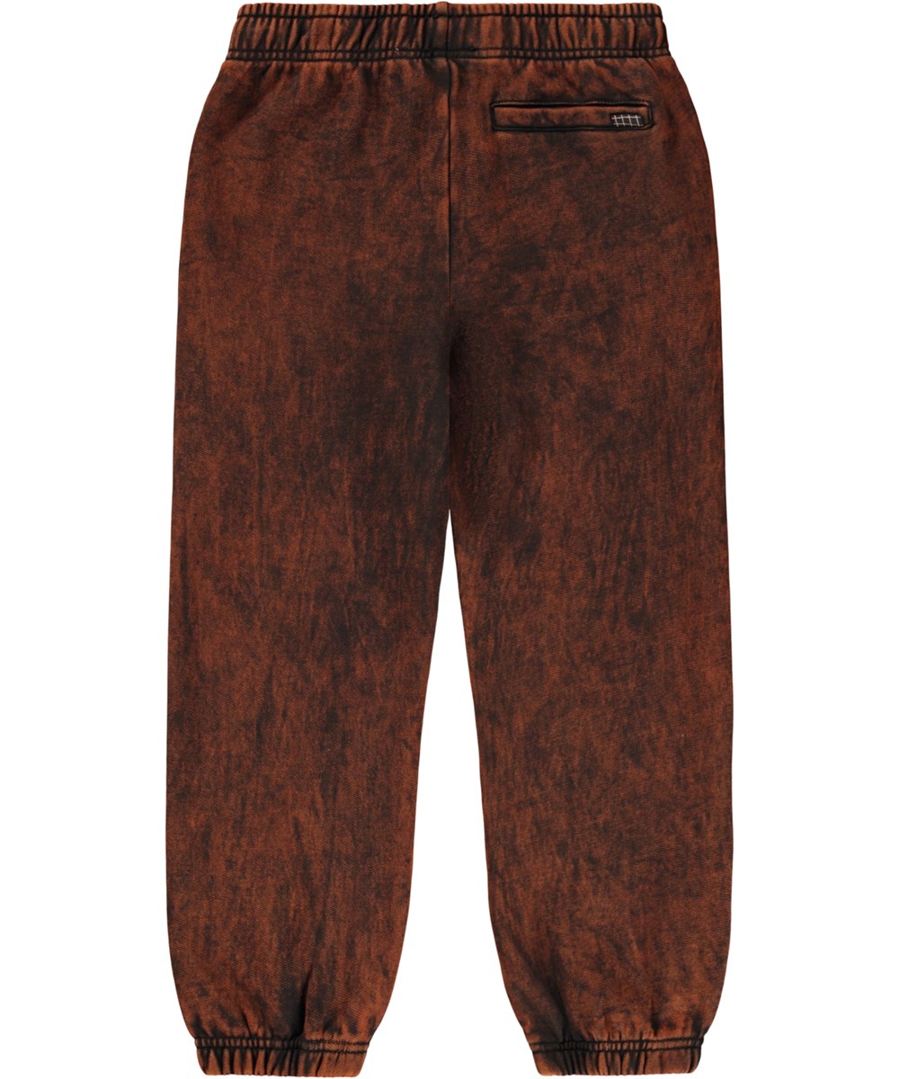 Allen - Russet Overdye - Sweatpants for children made of organic cotton in a red and black wash.