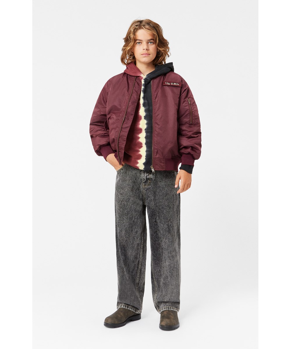 Aska - Black Stone - Dark grey oversized jeans with peace patch and adjustable waist.