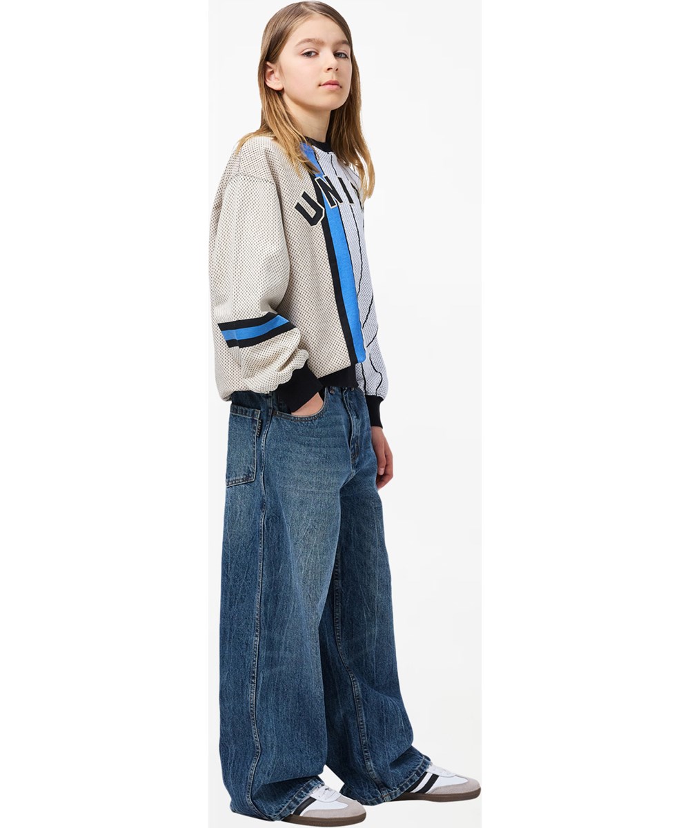 Askio - Creased Indigo - Blue denim jeans for children made of organic cotton with an adjustable waist 