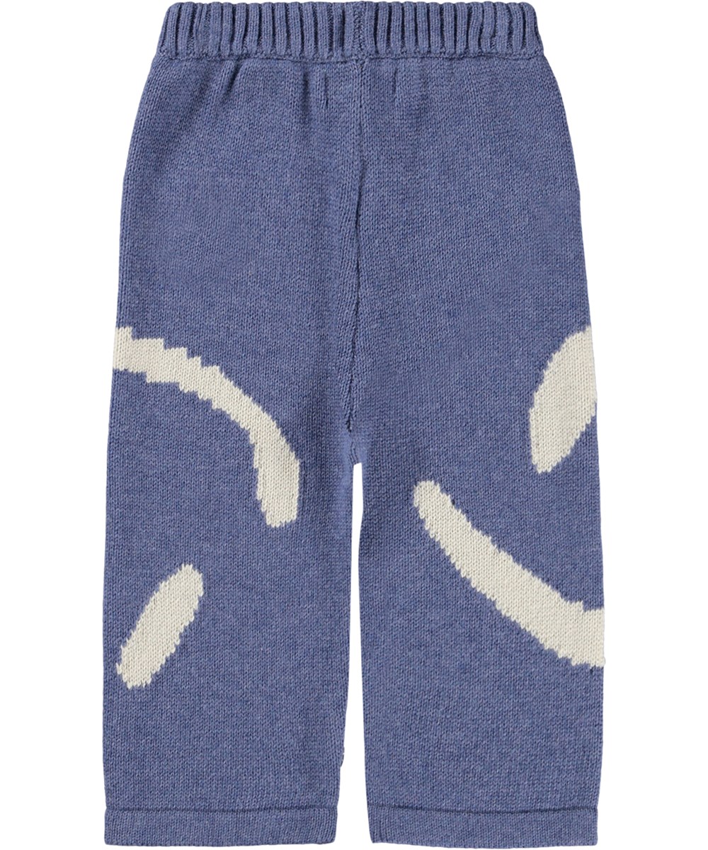 Sailor - Evening Marl - Knitted blue pants for the little onese made of a wool and cotton blend with a white smiling face.