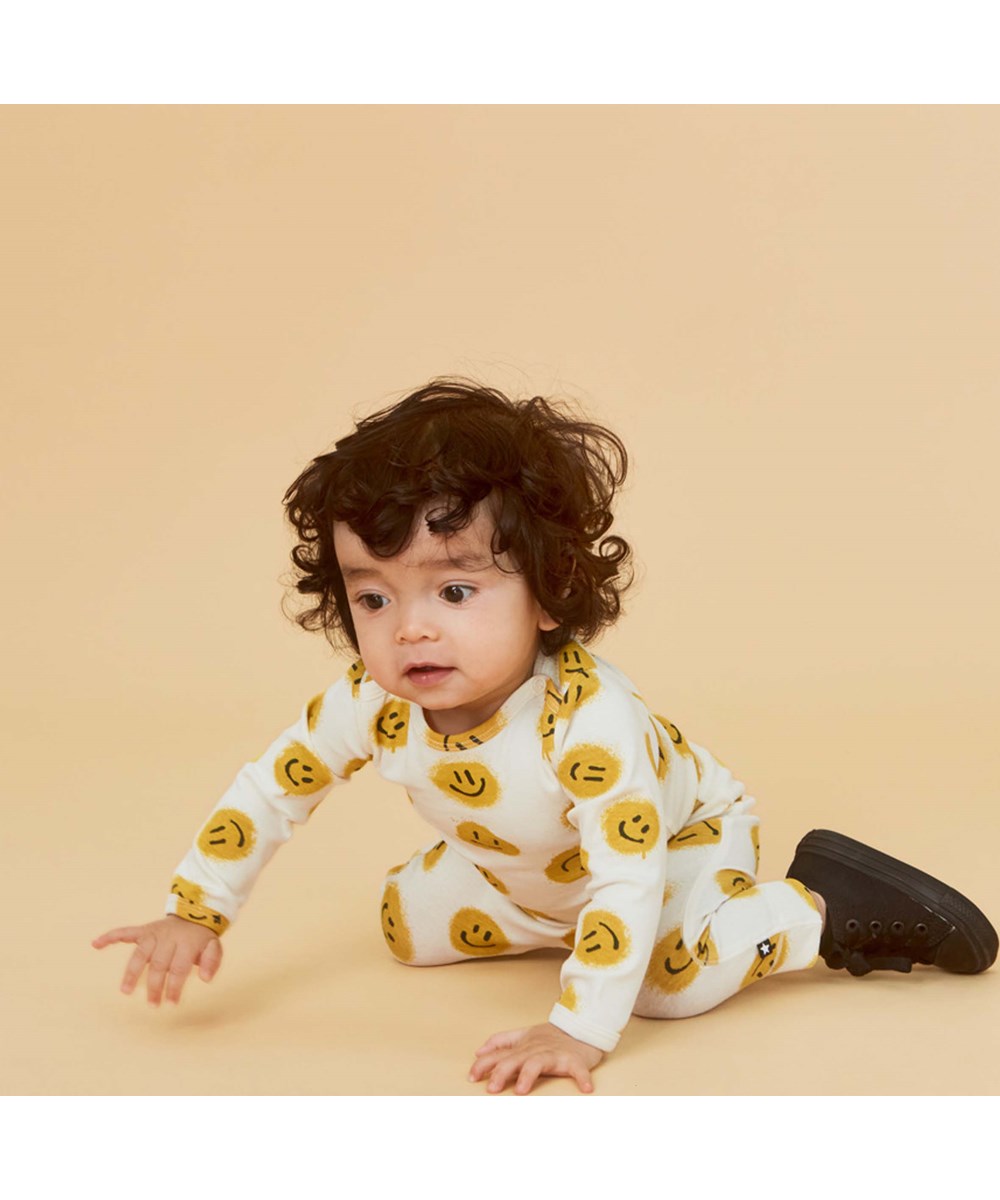 Seb - All Smiles - Organic baby trousers with smiley faces