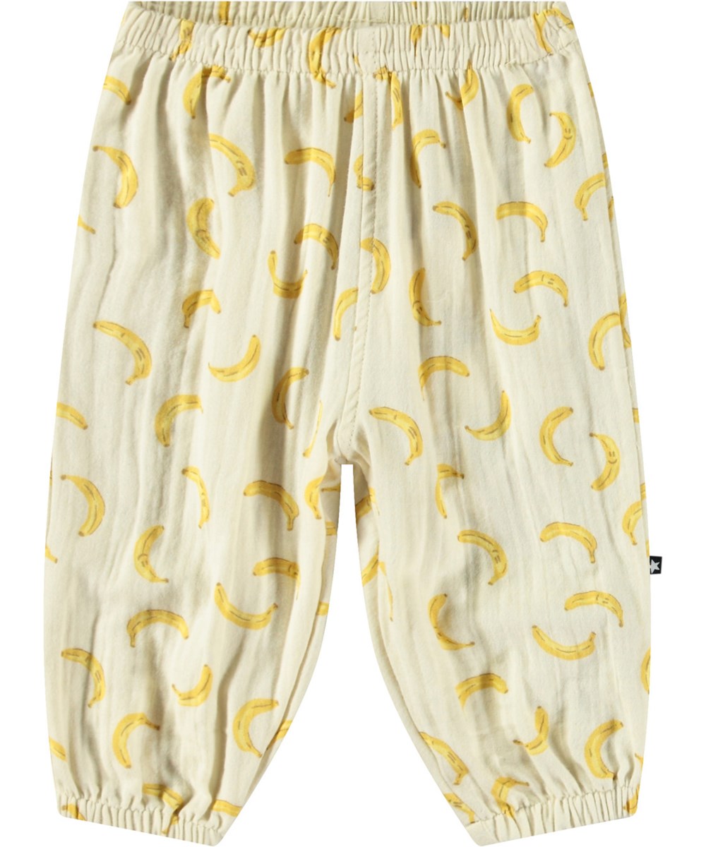 Serene - Cute Bananas - Off-white pants for babies and children in organic cotton with a loose fit, elastic waist, and legs.