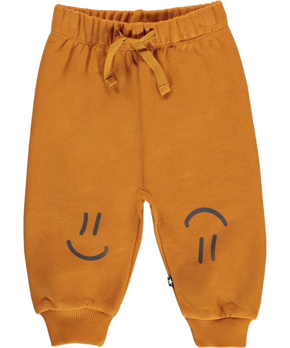 Simeon - Old Gold - Baby orange sweatpants with smiley face print