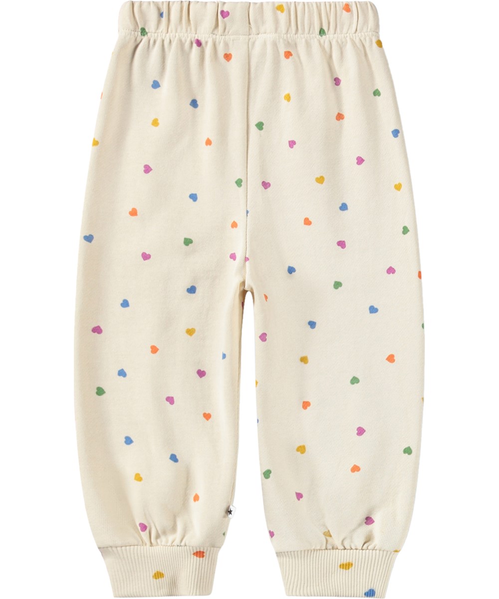 Simeon - Confetti_Rainbow - Soft, white sweatpants for the little ones made of organic cotton witha heart print