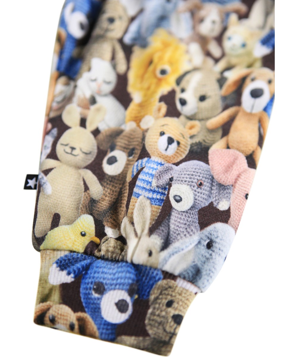 Simeon - Cute Crochet - Soft green pants for the little ones made of organic cotton with print of crocheted animals.