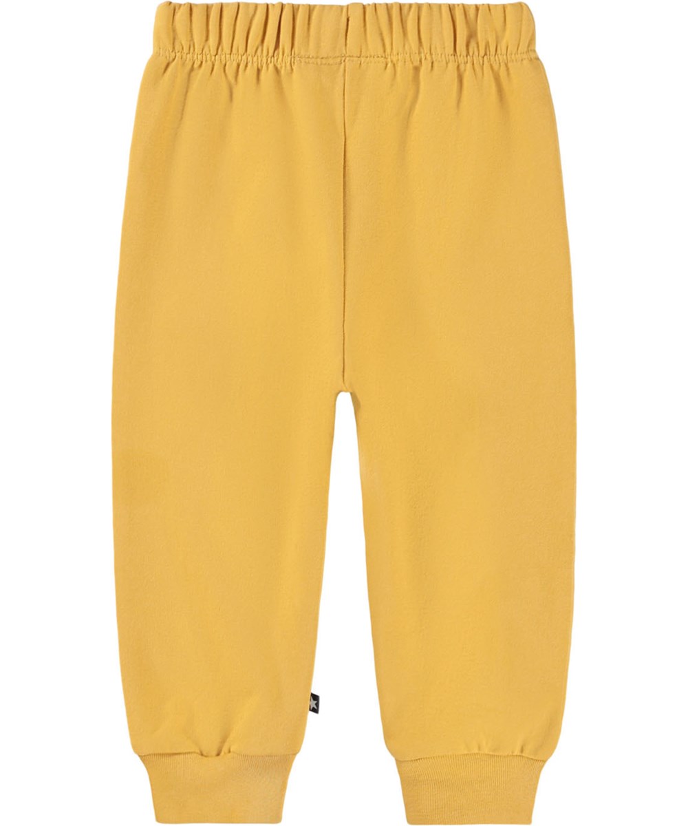 Simeon - Energy - Soft yellow pants for the little ones made of organic cotton with soft white faces on knees.