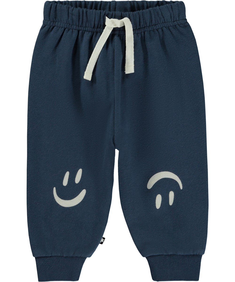 Simeon - Twilight - Blue organic baby trousers with a smiley face print on the knees 