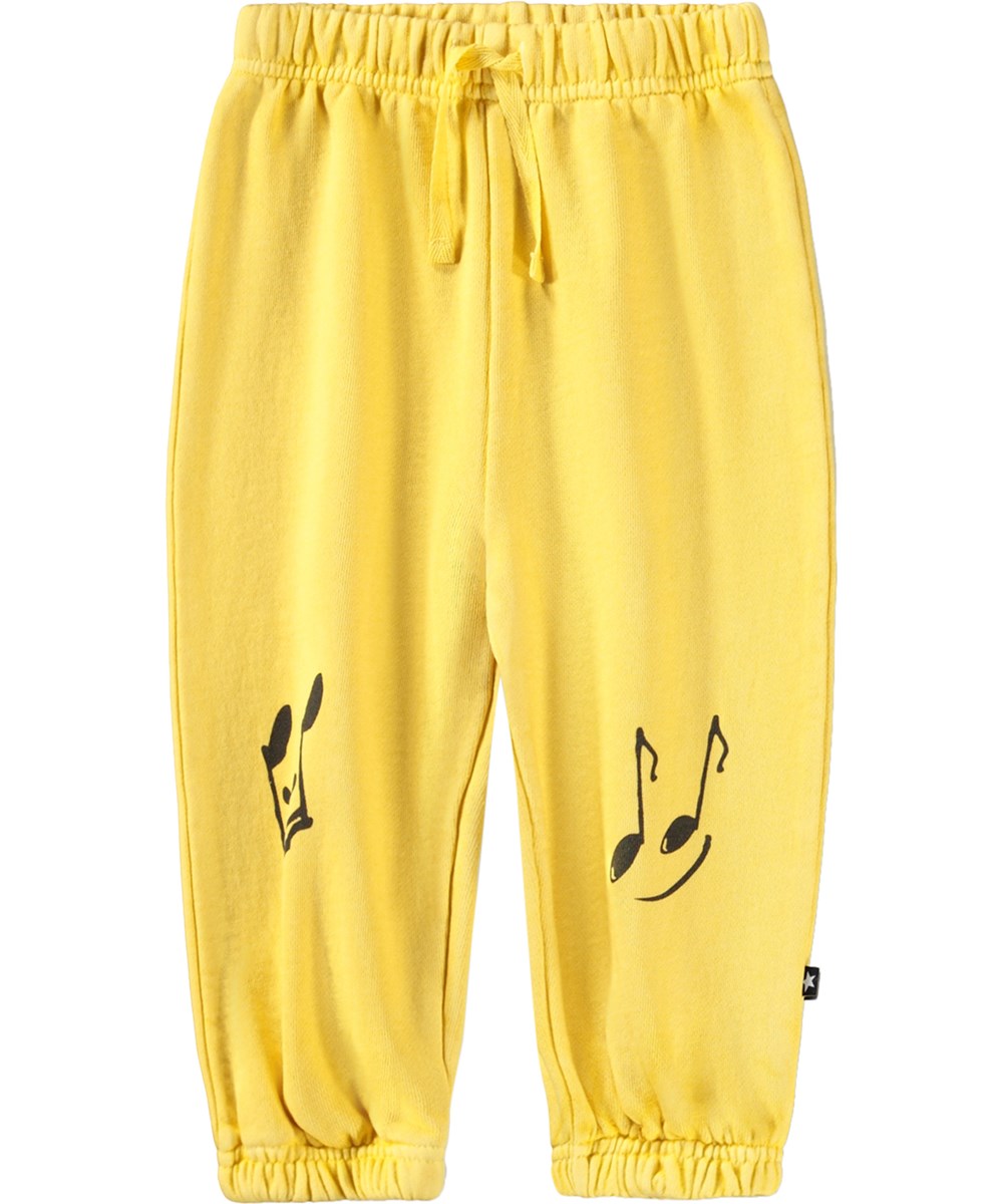 Simon - Sunshine - Soft, yellow sweatpants for the little ones made of organic cotton with a music print 