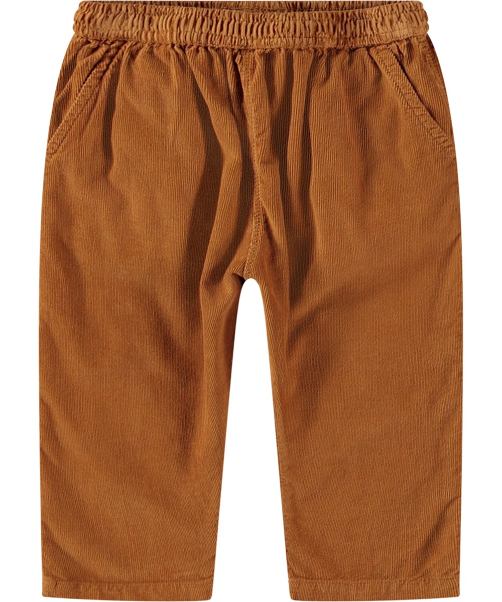 Sois - Brown Sugar - Orange organic cotton baby trousers with loose fit and elastic waistband.