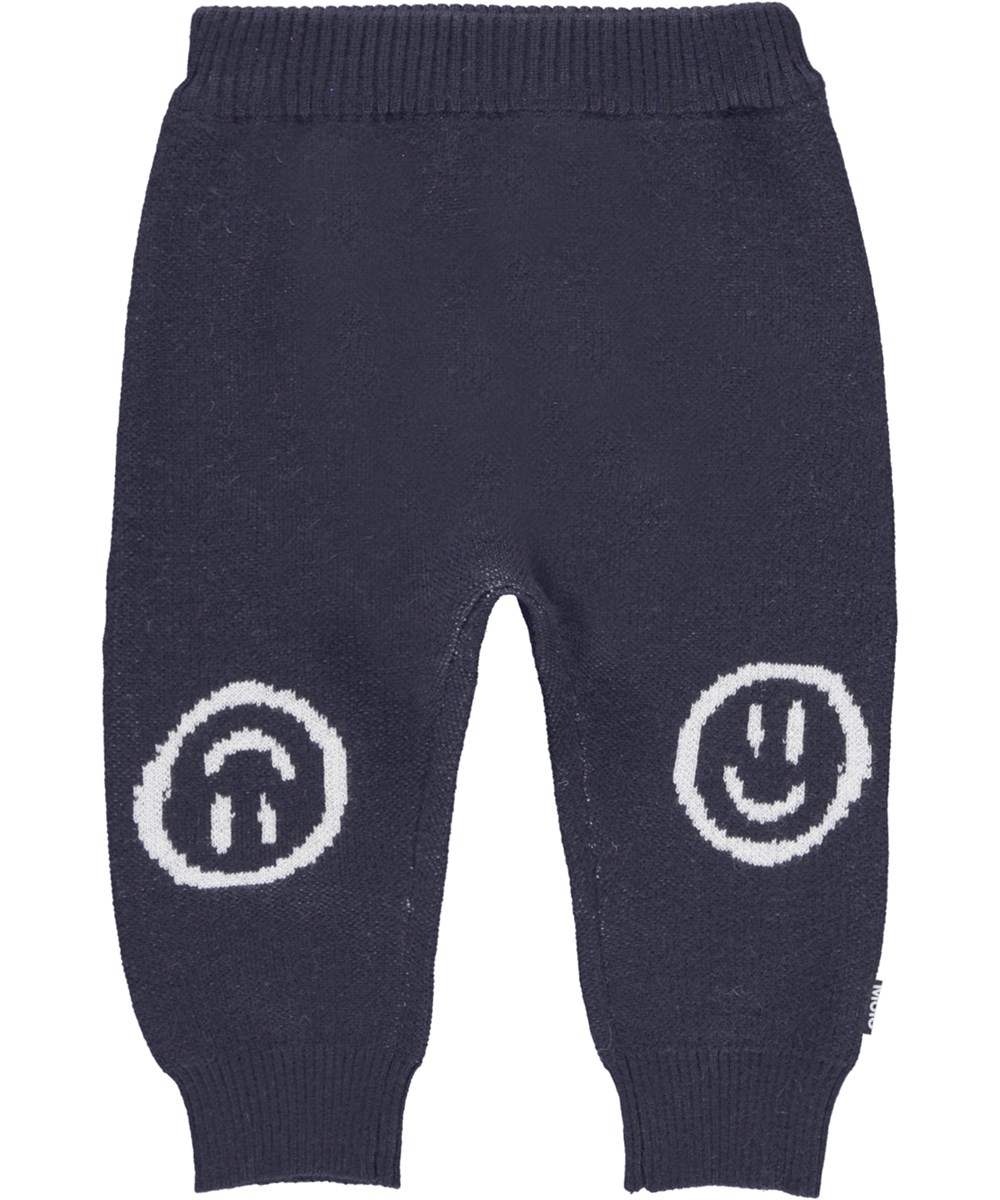 Sol - Galaxy Blue - Dark blue knit baby trousers with smiley faces