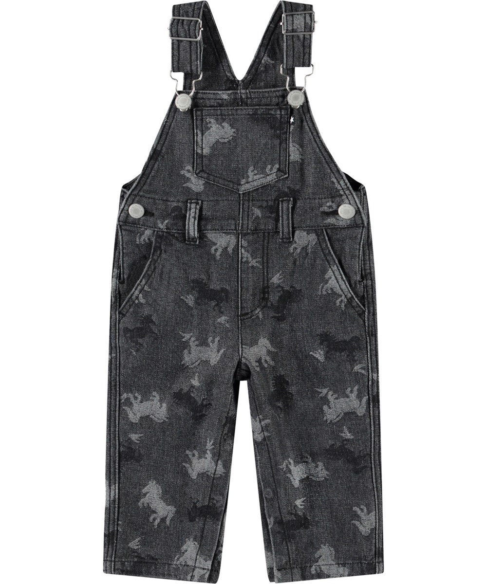 Spark - Giddy-Up Denim - Dungarees in organic cotton for baby. The dungarees are dark grey with jacquard-woven horses.