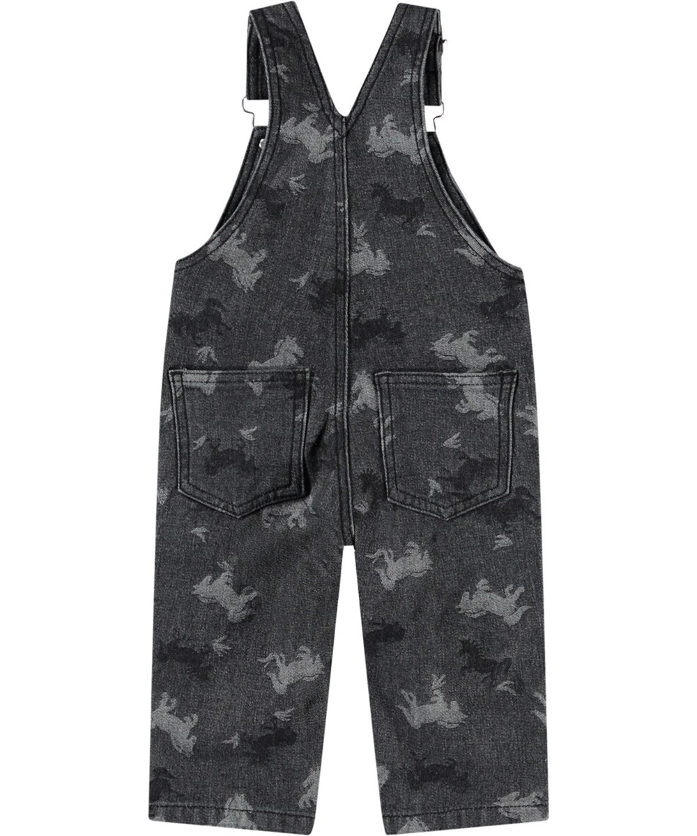 Spark - Giddy-Up Denim - Dungarees in organic cotton for baby. The dungarees are dark grey with jacquard-woven horses.