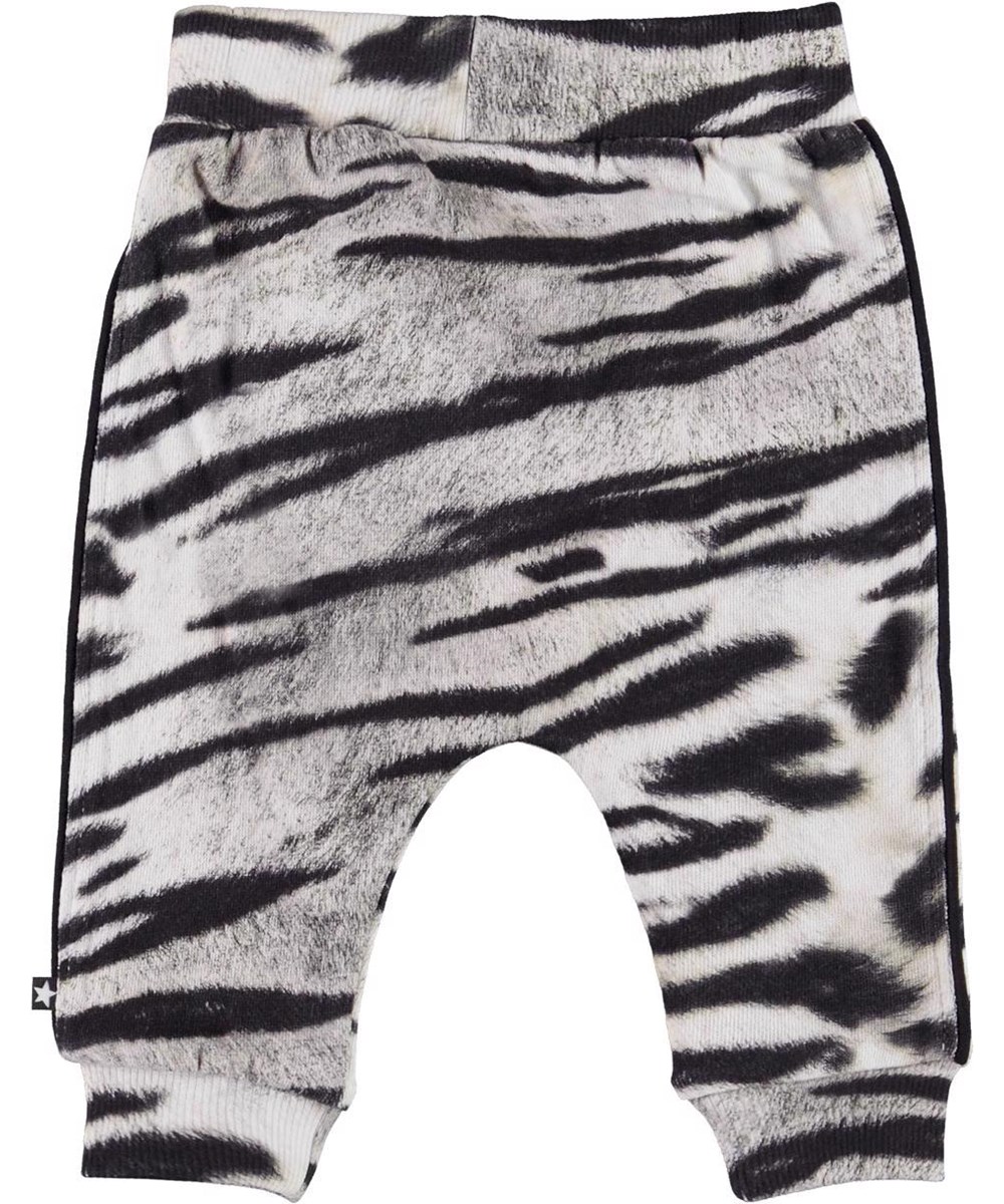 Steini - Tiger White - Organic baby trousers with black and white tiger print 