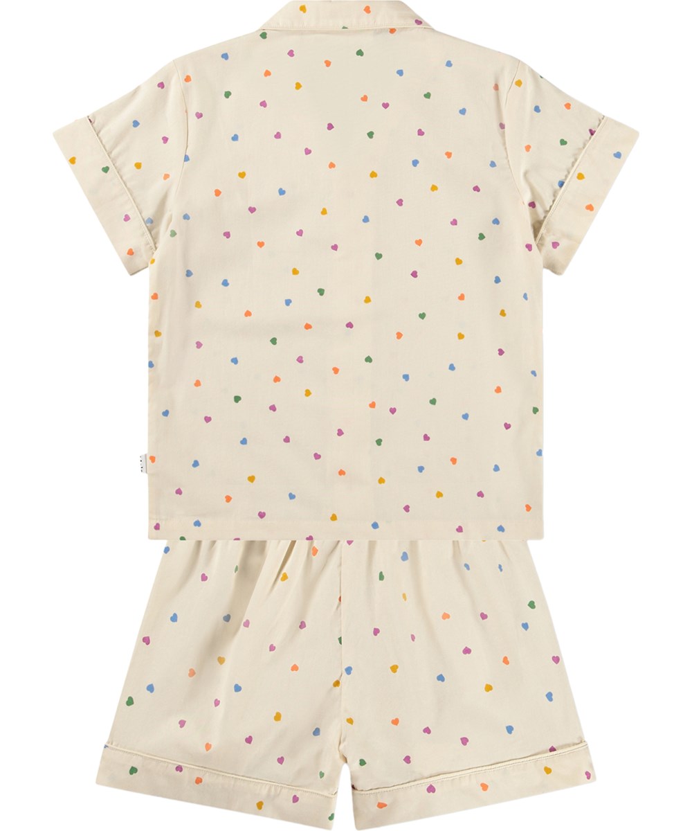 Lexi - Confetti_Rainbow - Beiges Pyjama-Set für Kinder aus Bio-Baumwolle mit Druck