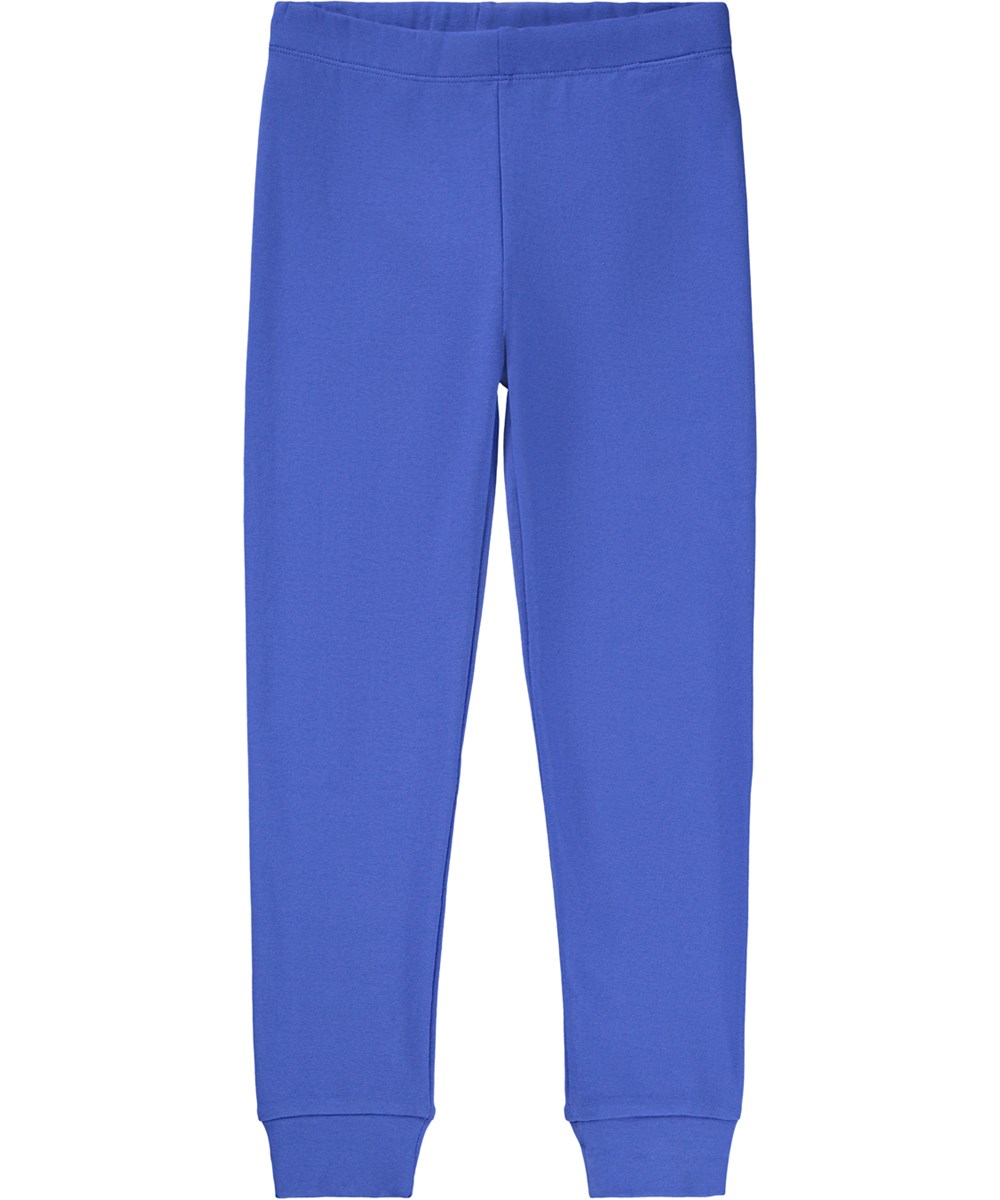 Lue - Dazzling Blue - Blaues Pyjama-Set für Kinder aus Öko-Baumwolle mit aufgesprühtem Lächeln in Schwarz.