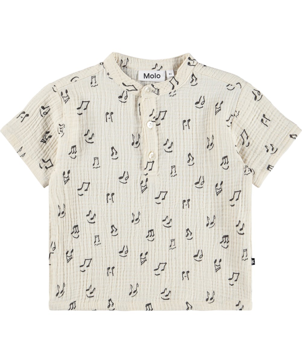 Evero - Happy Notes - Cream-coloured, short-sleeved polo shirt for the little ones made of organic cotton muslin with a music print