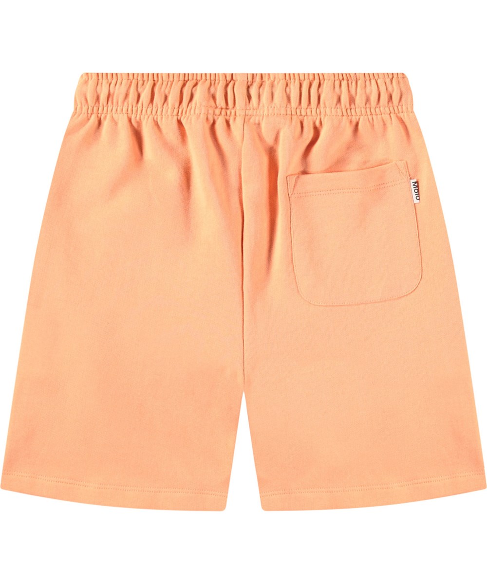 Adian - Cantaloupe - Orangefarbene Öko-Baumwoll-Sweatshorts für Kinder.