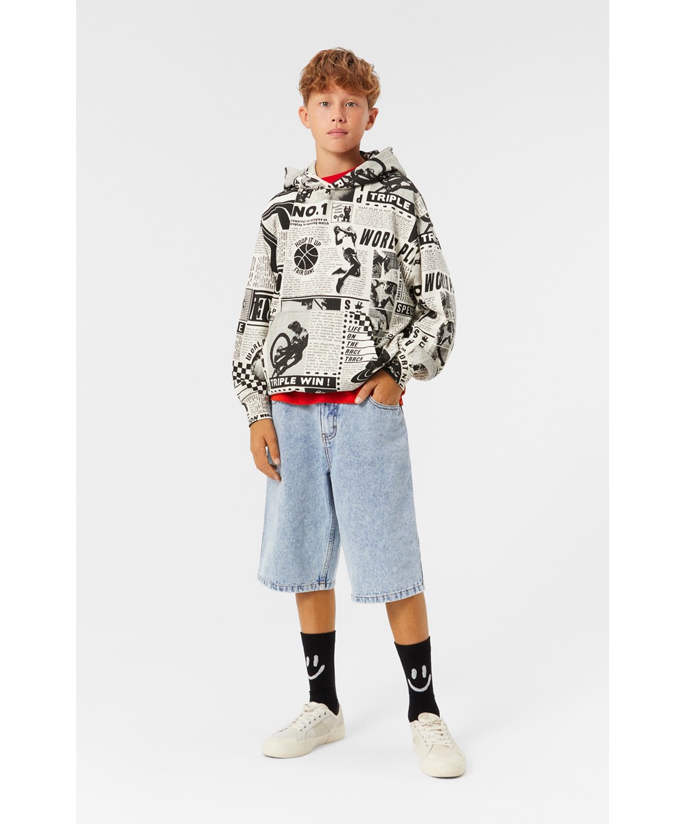 Art - Light Stone Denim - Light denim knee-length shorts made from organic cotton with adjustable waistband.