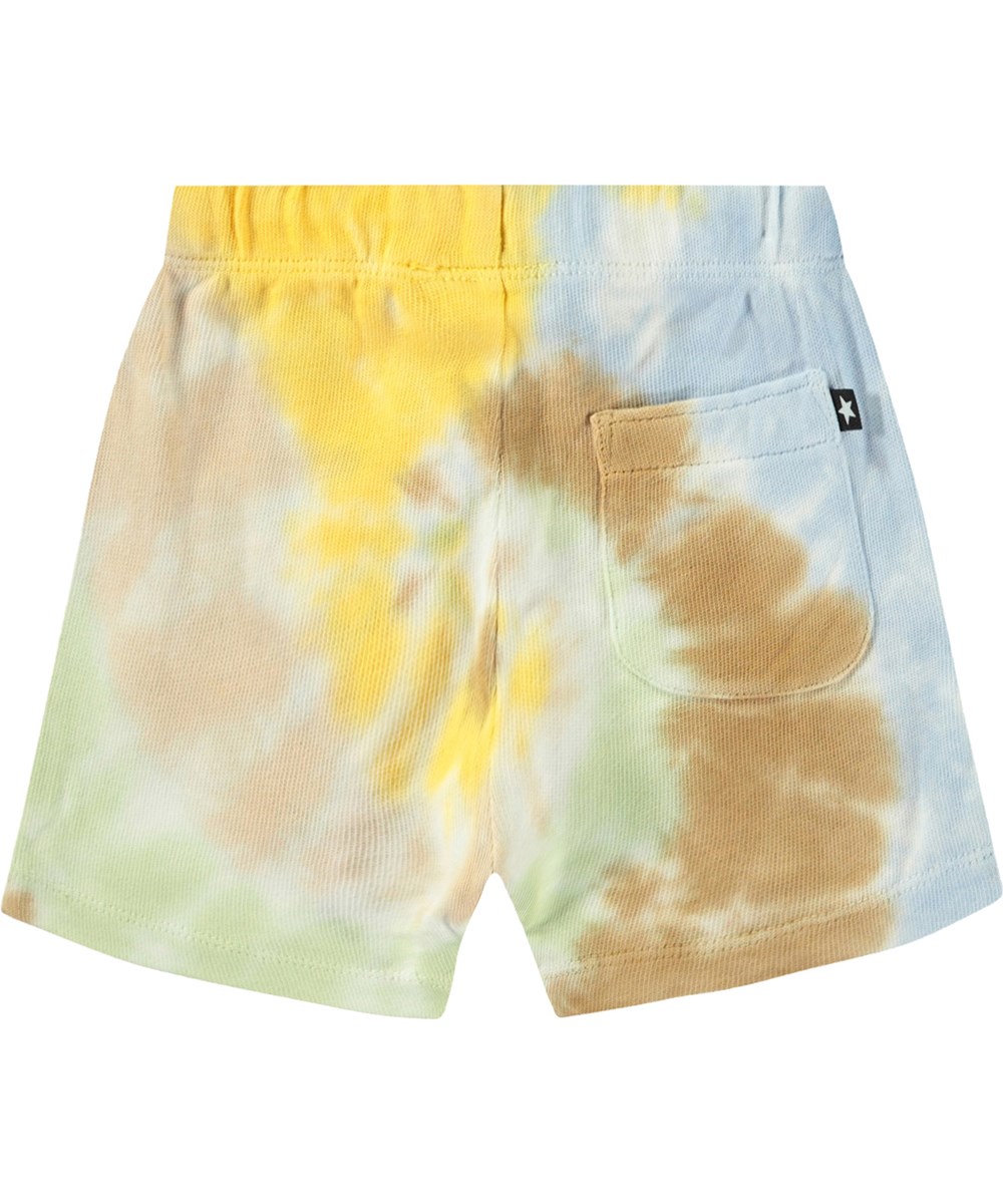 Simms - Tie Dye Swirl - Soft organic cotton shorts for baby. They are in a multicoloured tie-dye with an embroidered smiling face.