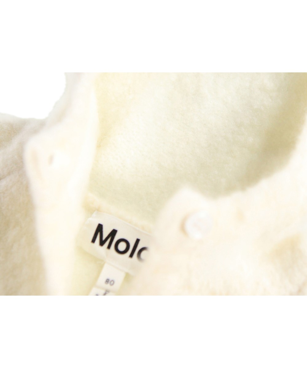 Bash - White Noise - Gebroken witte wollen vest voor de kleintjes gemaakt van een zachte wolmix.