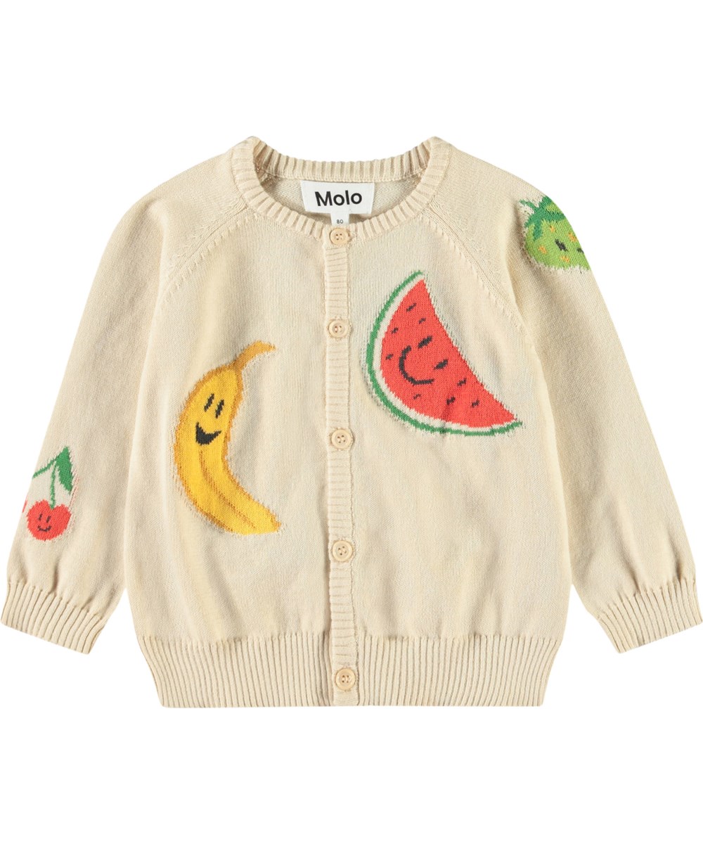 Brody - Cute Fruits - Knitted cardigan for baby in soft organic cotton. The cardigan is beige with cheerful fruits on it.