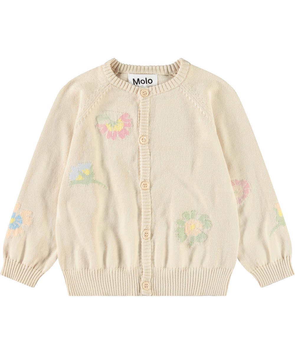Brody - Pastel Flora - Knitted cardigan for baby in soft organic cotton. The cardigan is beige with flowers.