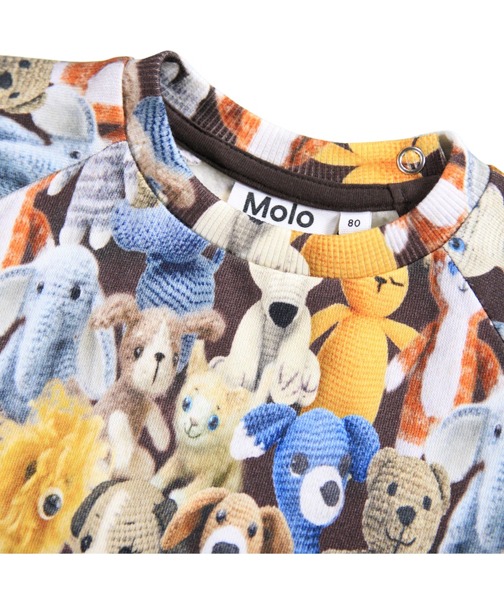 Disc - Cute Crochet - Sweatshirt for the little ones made of soft organic cotton with a colorful print of crocheted teddy bears.